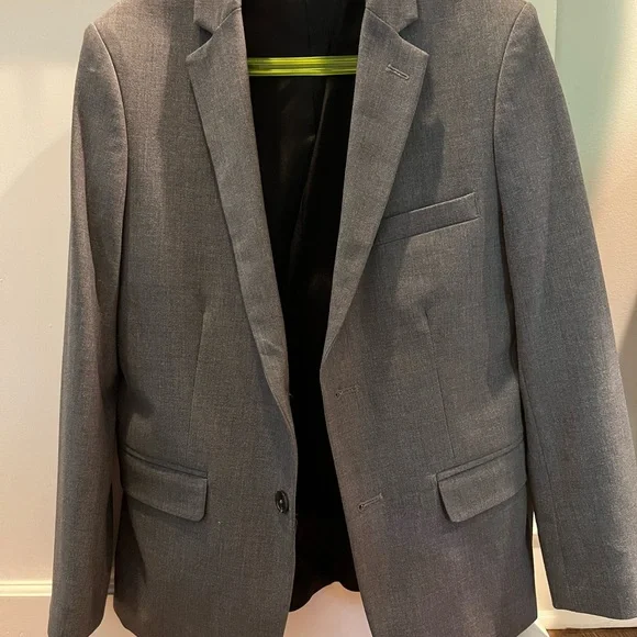 Boys slim stretch fit Calvin Kline gray suit. Size 12 pants/ 14 jacket